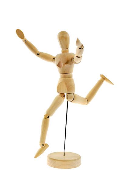 istock Wooden figure running isolated on white background 500617877