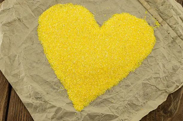 The yellow corn grits on the wrapping-paper