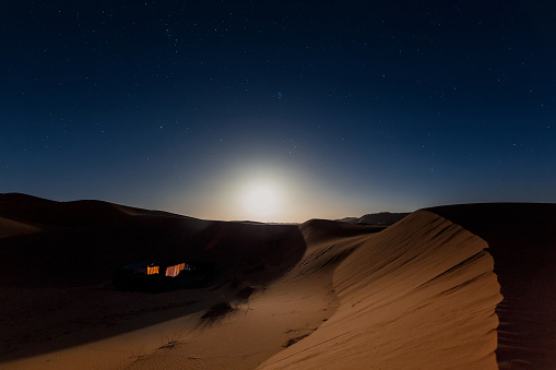 Bedouin nomad tent camp in Merzouga dunes, Morocco