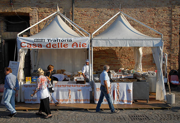 Cervia, Italy – September 12, 2015: restaurant stand at the annual International  party of the salt. A lot of tourists and locals participate and receive a bag of local produced famous salt.