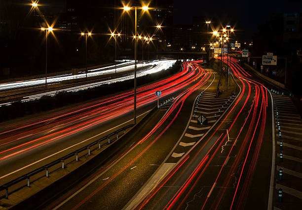 istock Long exposure highway car lights at night 500626648