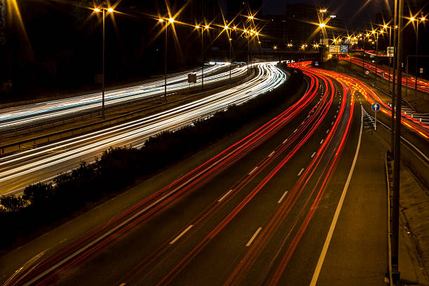 istock Long exposure highway car lights at night 500626662