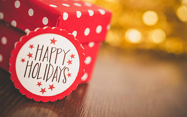 istock Bright Christmas gift with Happy Holidays message 500639402
