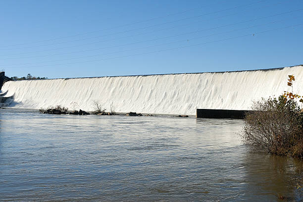 istock Water flowing over dam after heavy rains 500639584
