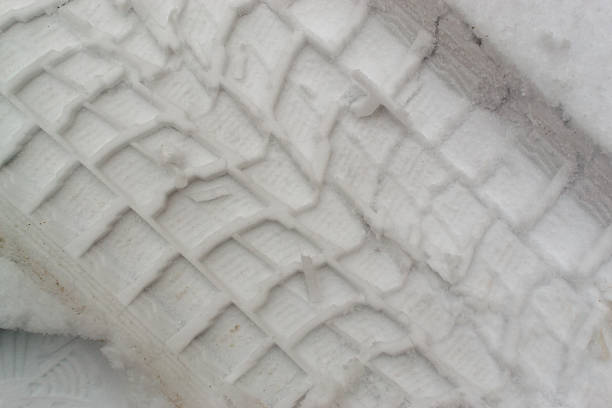 istock Car Tire Tracks in Fresh Winter Snow 500640594