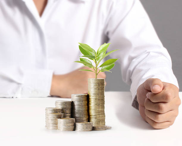 istock Human Hand coin to money 500642218