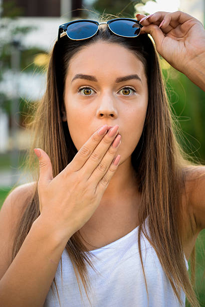 istock Young beautiful woman picks up glasses 500643080