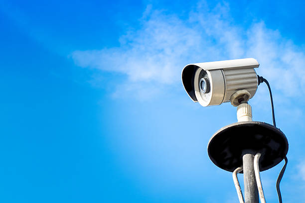 istock CCTV on building with blue-sky background 500644260