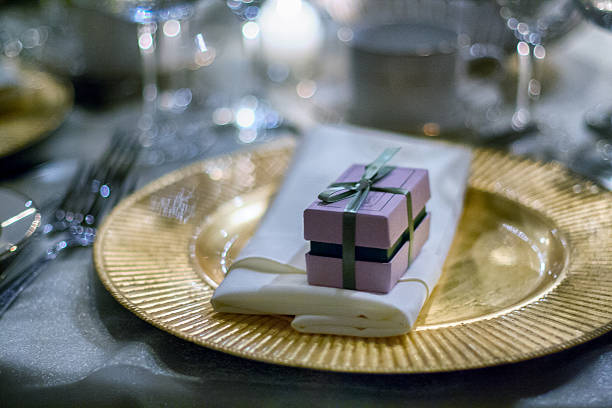 istock Giftbox on the golden plate. 500645873