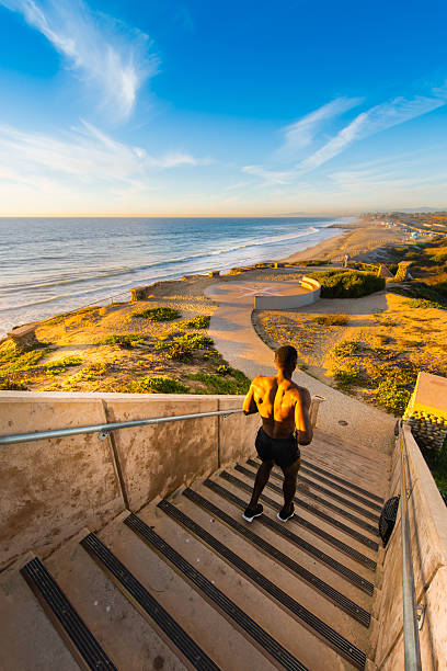 istock Muscular Man Running Up And Down The Stairs 500646242