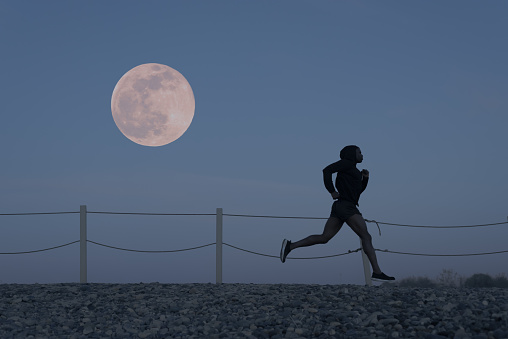 Full Moon Runner in mid stride