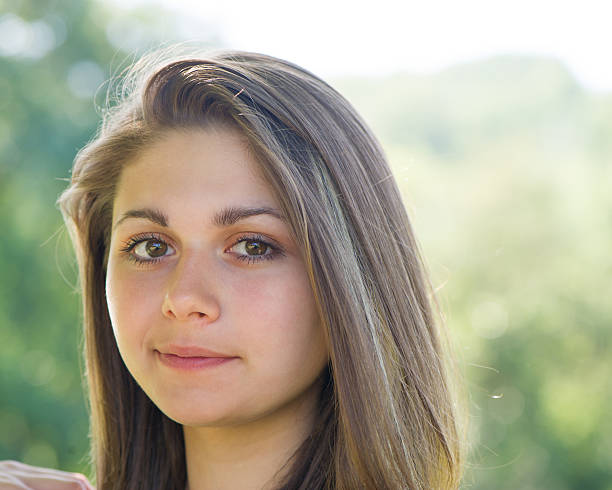 Girl look up in camera portraitGirl look up in camera portrait