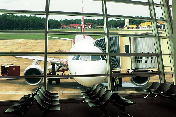 istock Airport window view at departure hall 500652100