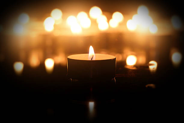 istock candle in the dark 500653296