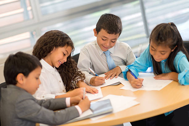 istock Kids in a business meeting 500661611