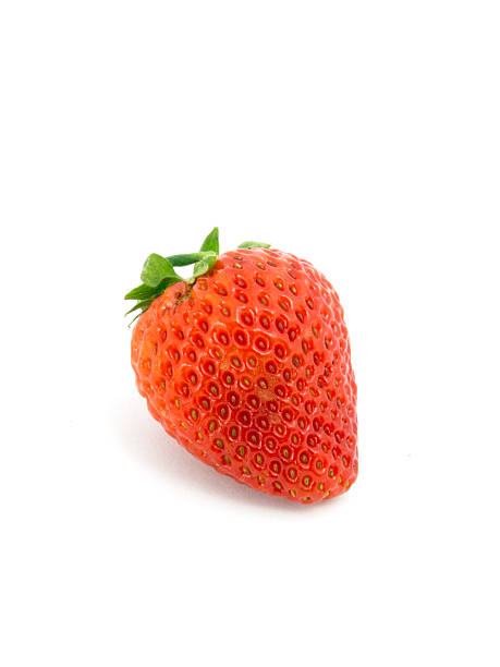 istock fresh strawberries isolated on white background. 500663735