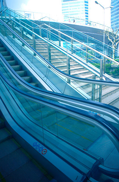 istock escalatorat an outdoor shopping mall 500665615