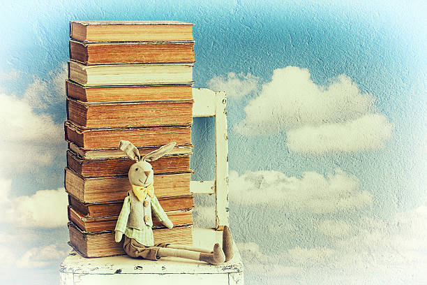 istock Vintage background with old books and bunny toy 500665839