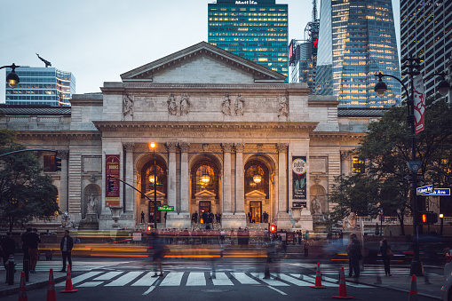 New York City, United States of America- September 26, 2015: Public Library facade , on 26 September 2015. The New York Public Library is a public library system in New York City. With Nearly 53 million items, the New York Public Library is the second Largest Public Library in the United States, and Fourth Largest in the World