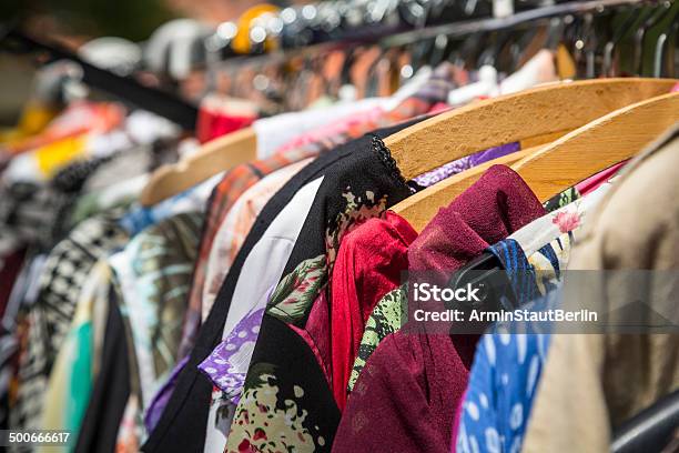 Clothes On A Rack On A Flea Market Stock Photo - Download Image Now - Thrift Store, Street Market, Garment