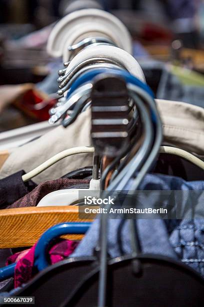 Clothes On A Rack On A Flea Market Stock Photo - Download Image Now - Abundance, Car Trunk Sale, Casual Clothing