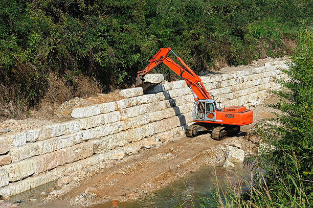 Excavator pracujących na rzekę – zdjęcie