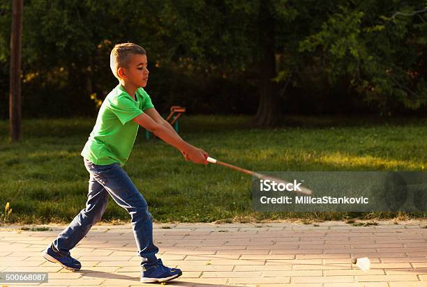 Cute Mixed Race Teenager With A Tennis Racket Stock Photo - Download Image Now - Tennis, Boys, Playful