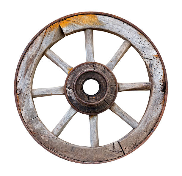 istock Old wooden wheel on white background 500668497