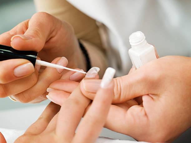 istock Girl fingernails being manicured. 500669614