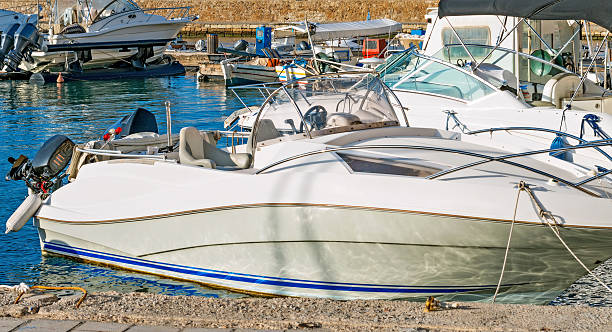 istock Several motor boats moored at the dock. 500670494