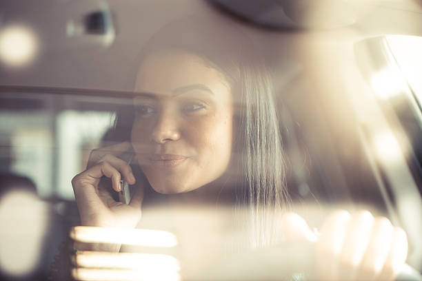 istock Driver driving a car distracted on the phone 500675230
