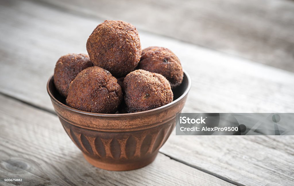 Bowl of meatballs on the wooden background Baked Stock Photo