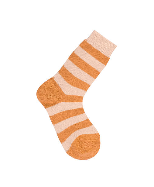 istock orange striped socks isolated on white background 500676184