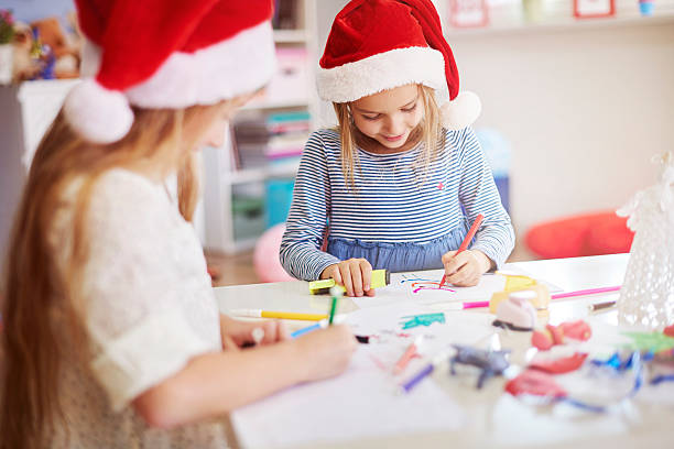 istock Children drawing some christmas paintings 500677976