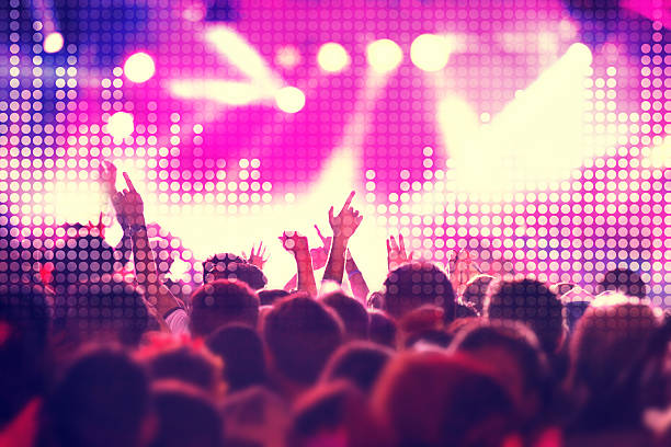 istock Dancing people with arms raised at concert, equalizer sound wave 500678226