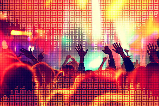 Ecstatic people at music concert with equalizer sound wave