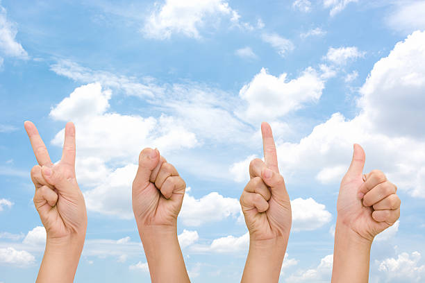 istock Abstract woman hands symbol 2016 signs with cloud sky. 500678632