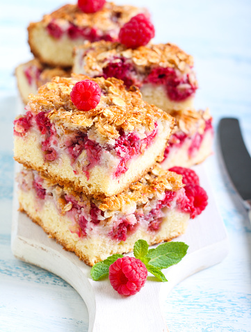 Raspberry crumble cake slices, selective focus