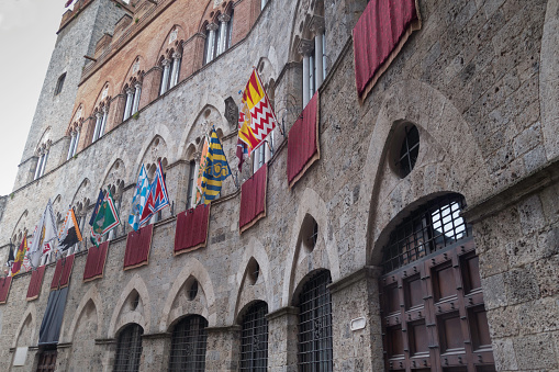 Palace  with flags of the different Siena contrades 