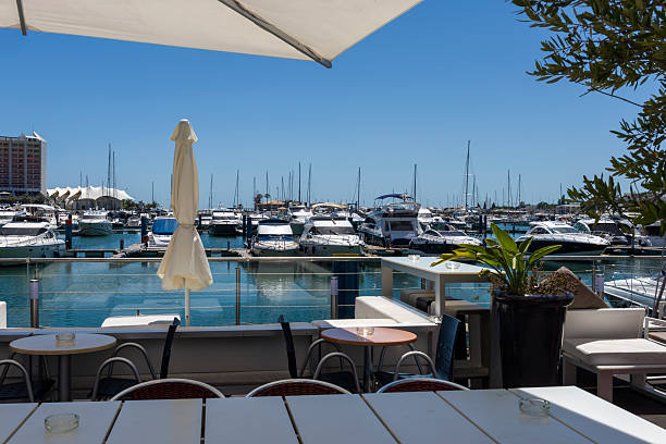 istock Luxurious yachts docked in marina 500684845
