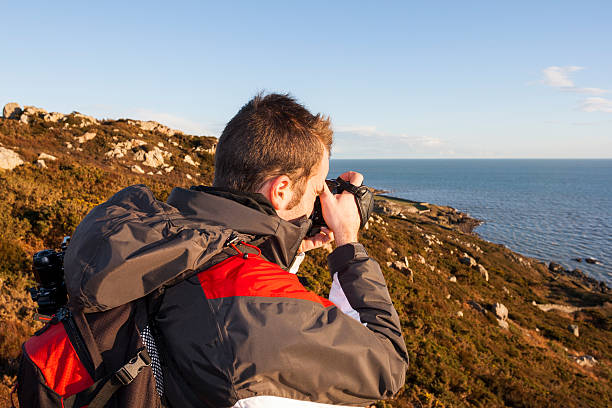 istock Young adult photographing 500686955