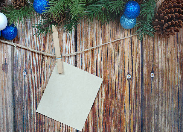 Rustic Tag with Evergreen and Decorations stock photo