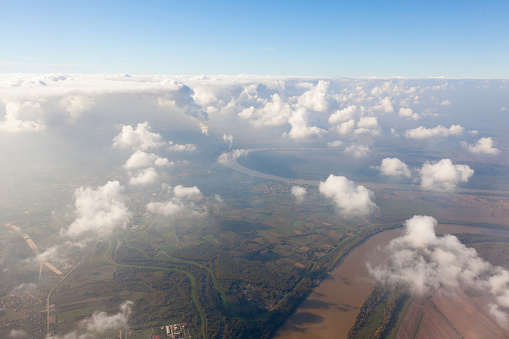 aerial view of clouds and river