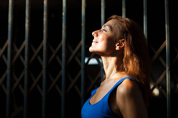 istock young woman enjoying sunlight 500693166