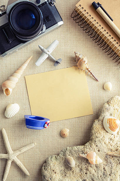 istock Travel and vacation accessories on sackcloth background 500693344