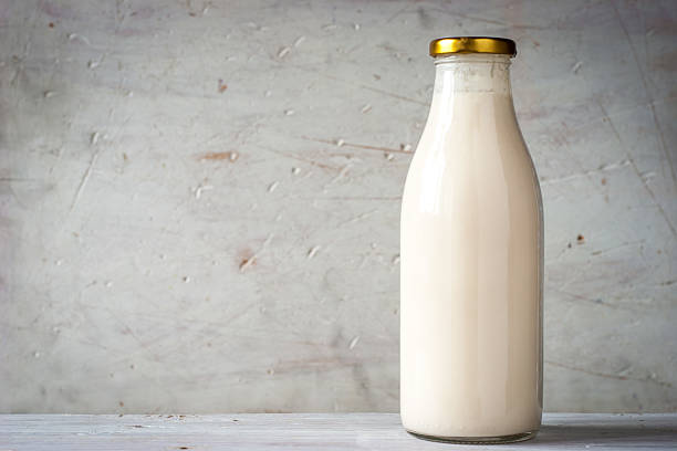 Natural yogurt in the glass bottle horizontal