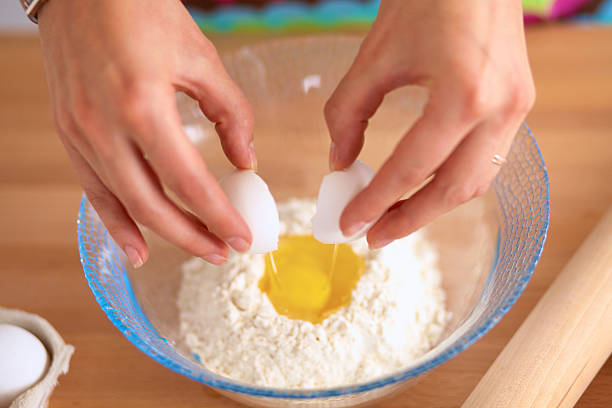istock young woman in the kitchen, isolated on background 500697134