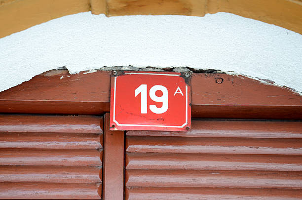 istock House number 19 on a red plate 500698218