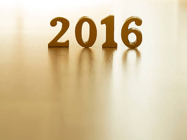 istock Numbers 2016 wood gold for new year 500698370