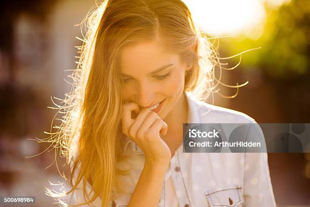 Charming Girl Smiling Stock Photo - Download Image Now - Sunlight, Human Hair, Sun